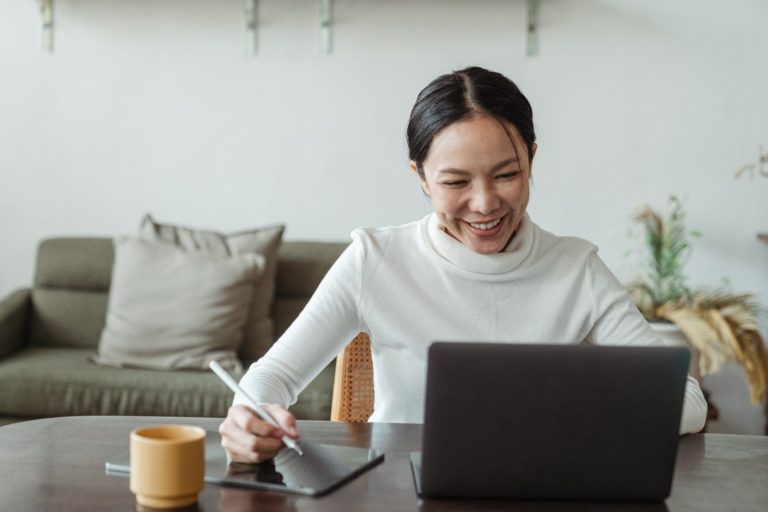 Woman sitting at computer